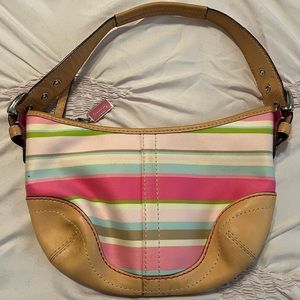 Authentic Coach small colorful bag with tan leather accents & zip closure.